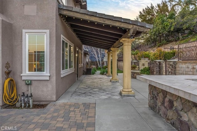 view of patio with cooling unit and fence