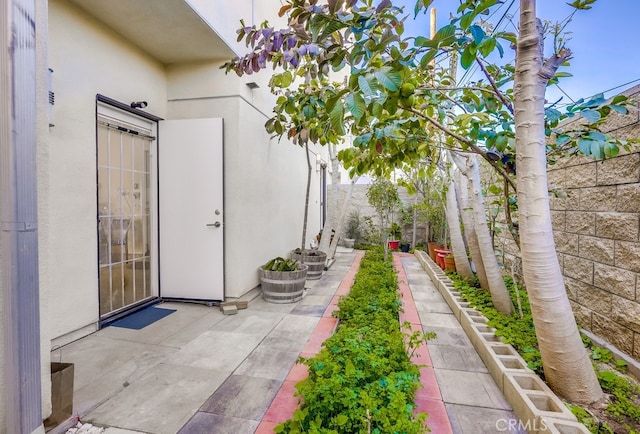 exterior space featuring a patio area and a fenced backyard