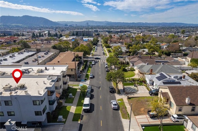 birds eye view of property featuring a residential view and a mountain view