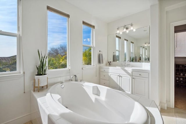 bathroom with a bathtub and vanity