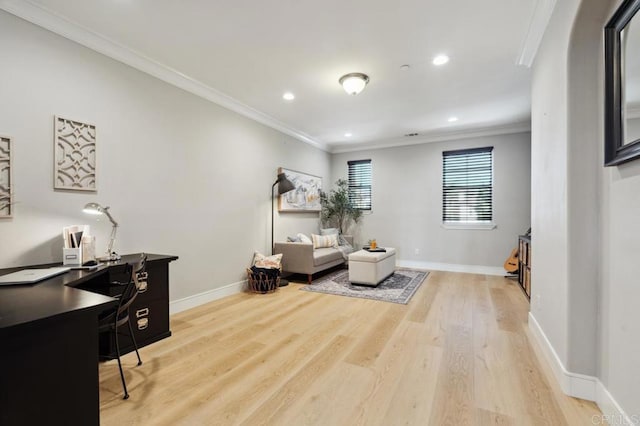 interior space featuring light wood finished floors, baseboards, ornamental molding, and recessed lighting