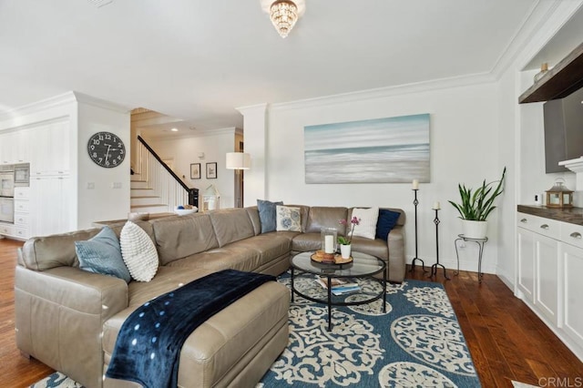 living room featuring baseboards, stairway, dark wood-style flooring, and crown molding