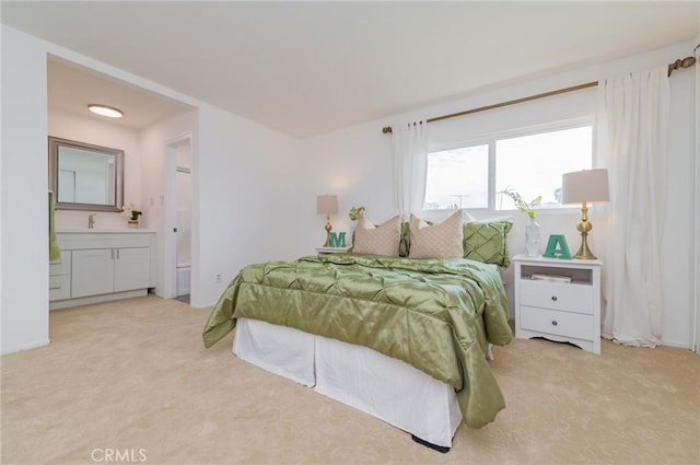 bedroom with light colored carpet