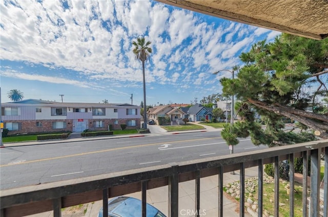 balcony featuring a residential view