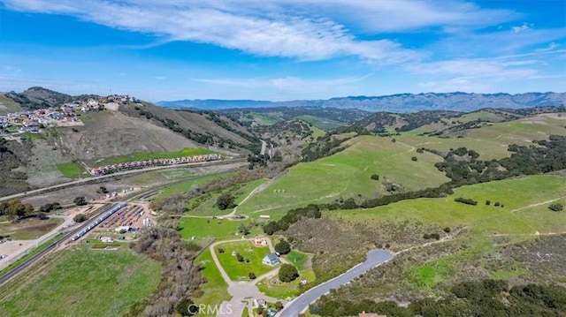 drone / aerial view featuring a mountain view