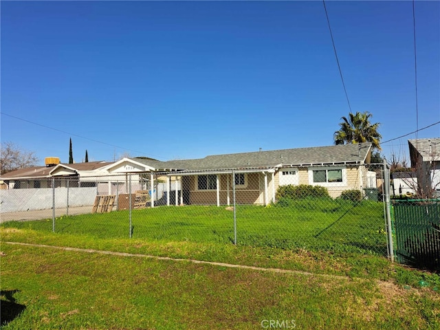 view of front of property with a front yard and fence