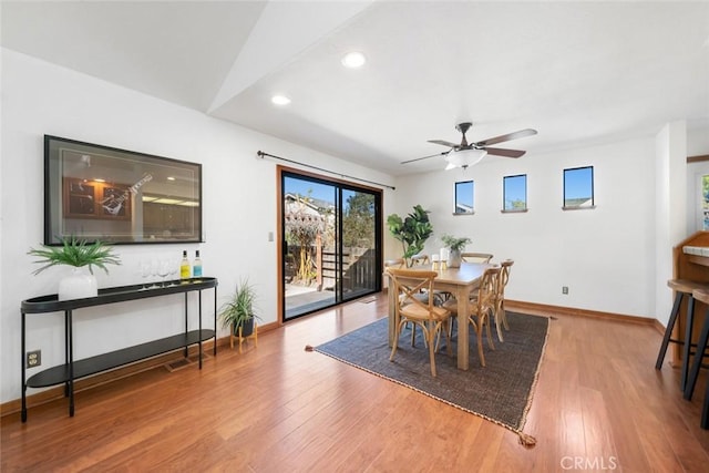 dining area with ceiling fan, baseboards, wood finished floors, and recessed lighting