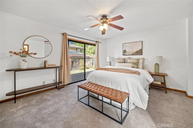 bedroom featuring light carpet, access to outside, a ceiling fan, and baseboards