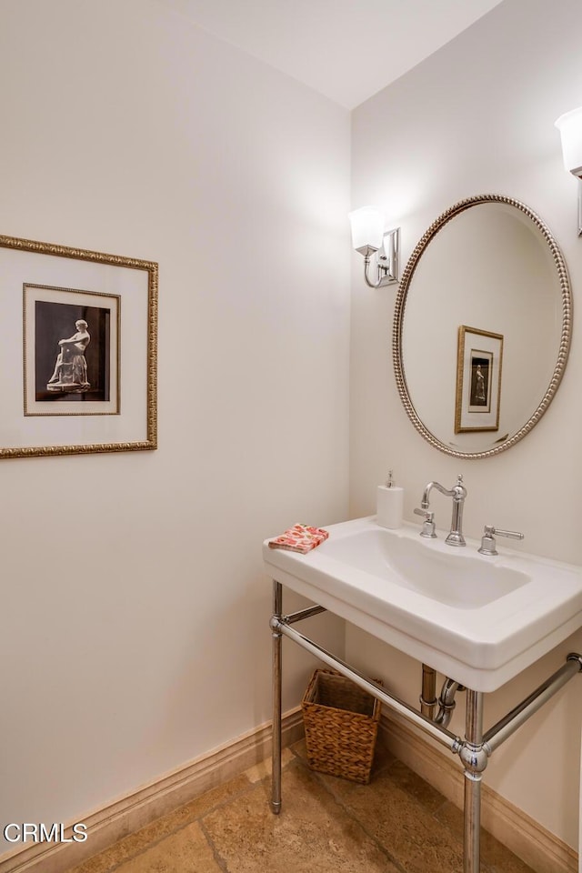 bathroom featuring baseboards