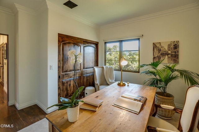office area featuring dark wood-style floors, baseboards, and crown molding