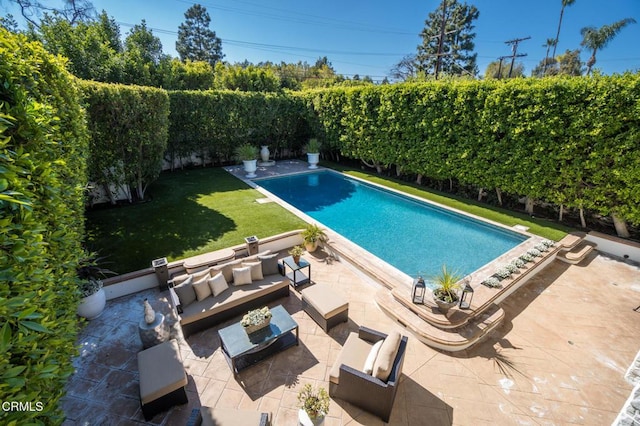 view of pool with a fenced in pool, a patio area, a fenced backyard, an outdoor hangout area, and a lawn