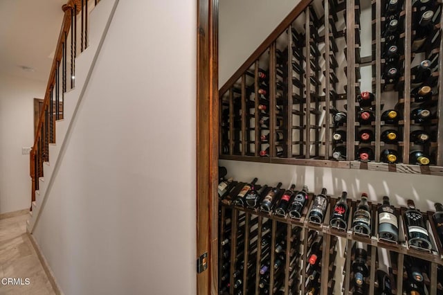 wine area featuring baseboards