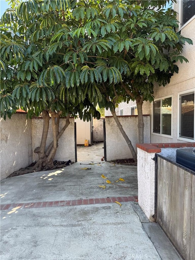 view of patio / terrace featuring fence