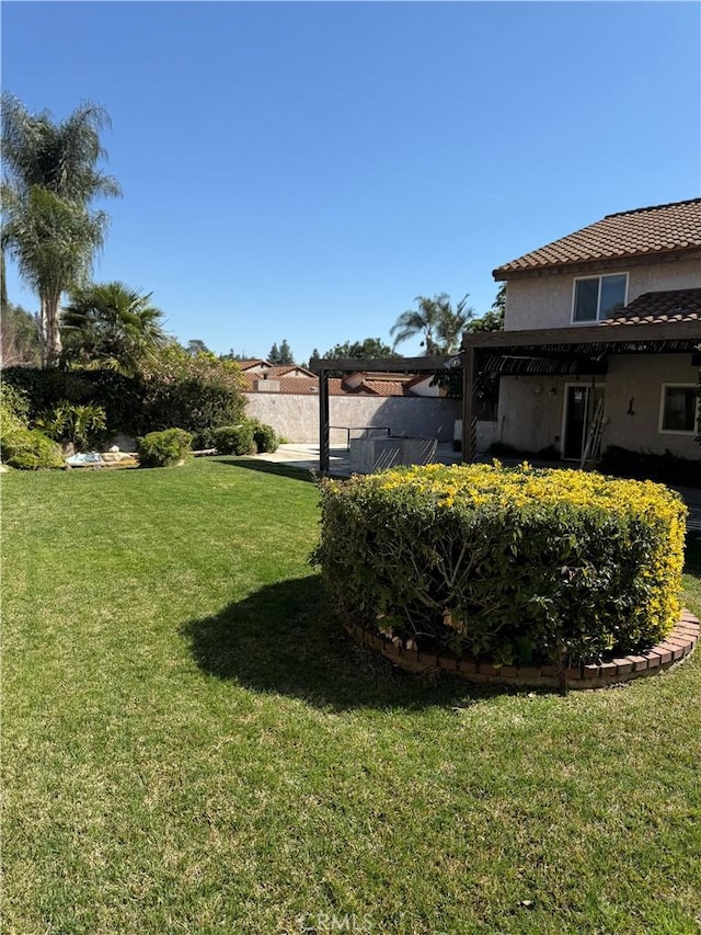 view of yard with a pergola