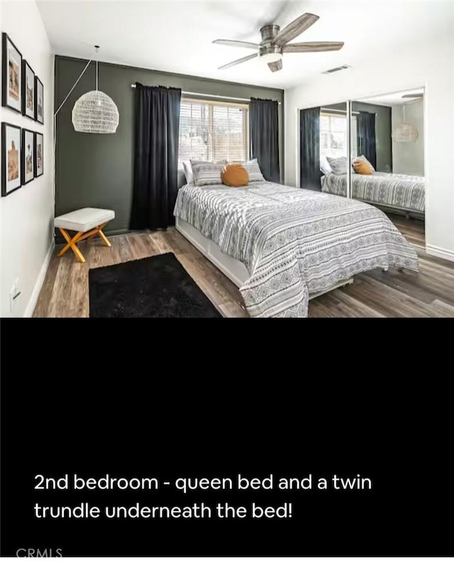 bedroom with visible vents, ceiling fan, baseboards, and wood finished floors