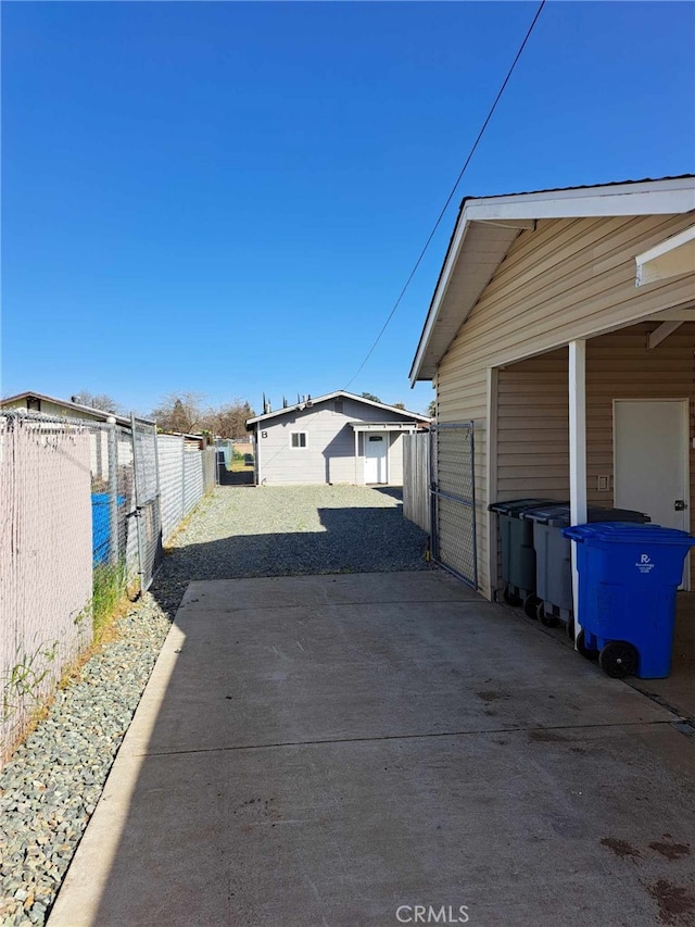 view of side of property with fence