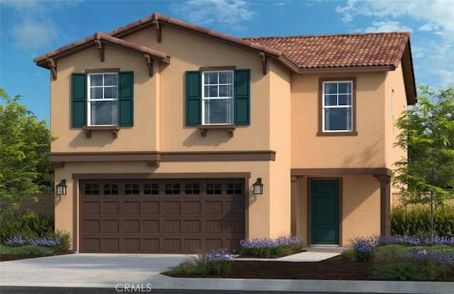 view of front of home with a tiled roof, concrete driveway, an attached garage, and stucco siding