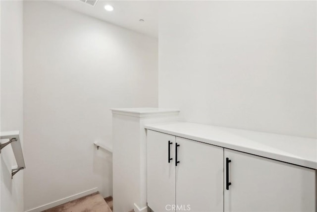 room details featuring baseboards, carpet flooring, and recessed lighting