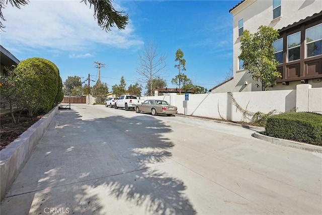 view of road with curbs