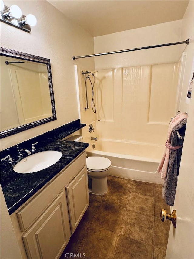 full bathroom featuring toilet, tile patterned flooring, bathtub / shower combination, and vanity