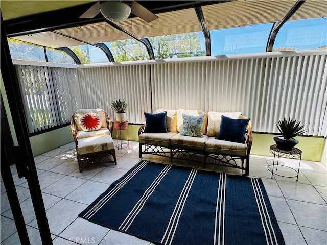 view of patio with ceiling fan and an outdoor living space