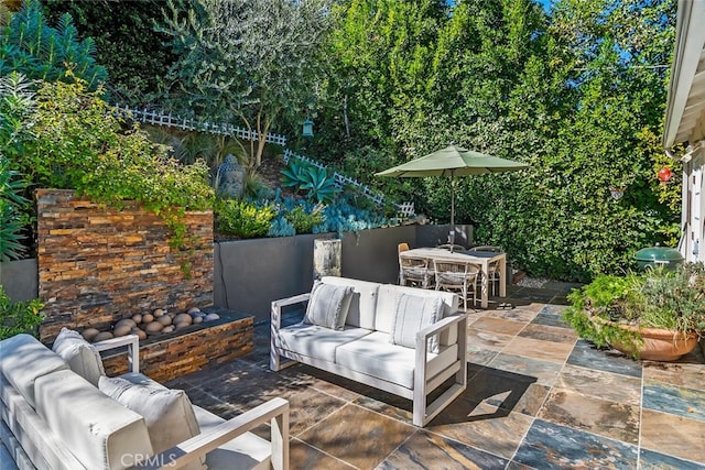 view of patio / terrace featuring outdoor dining area and outdoor lounge area