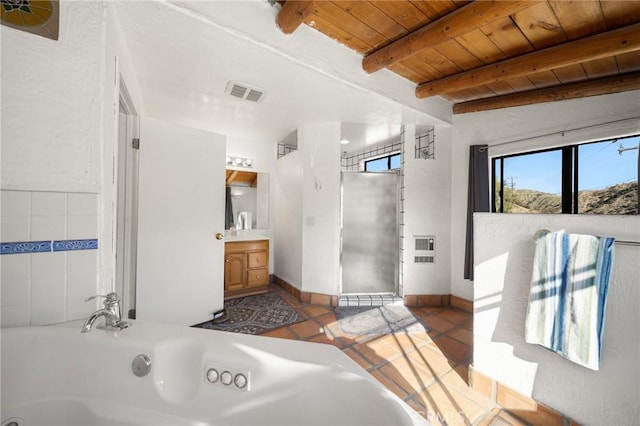 full bath with beam ceiling, visible vents, wood ceiling, vanity, and a tub with jets