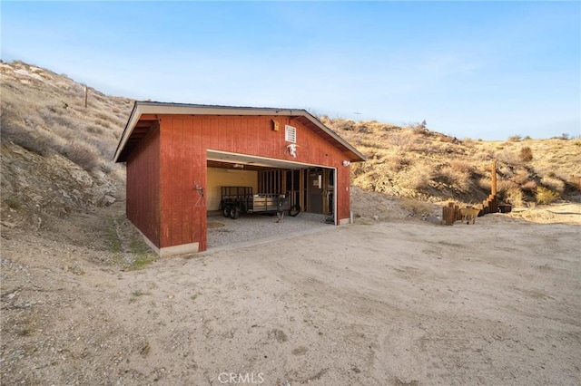 view of outbuilding with an outbuilding