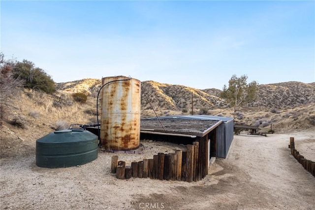exterior space featuring a mountain view