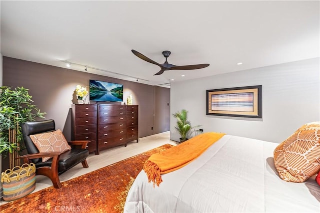 bedroom featuring a ceiling fan and track lighting