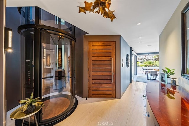 hall featuring light wood finished floors