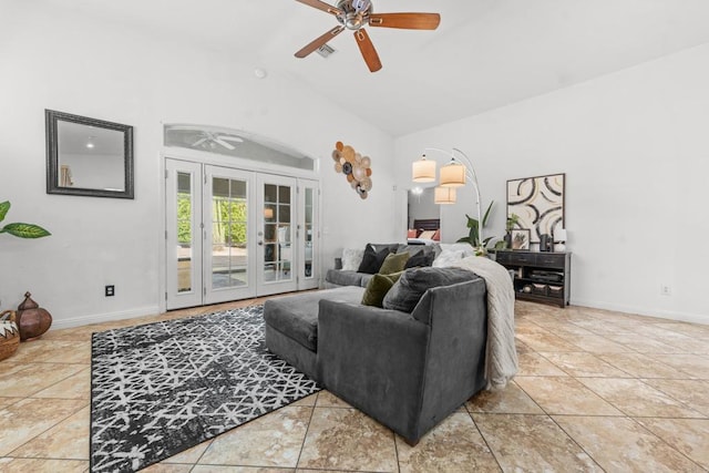 living room featuring vaulted ceiling, french doors, baseboards, and tile patterned floors