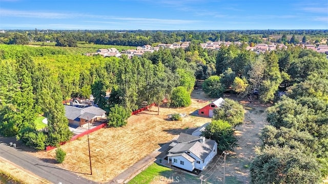 drone / aerial view with a view of trees