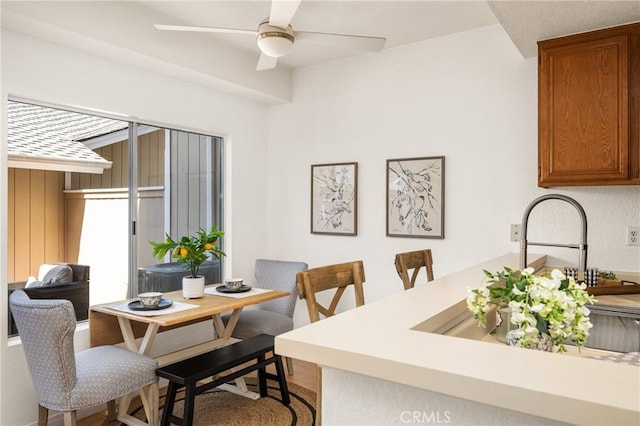 dining area featuring a ceiling fan