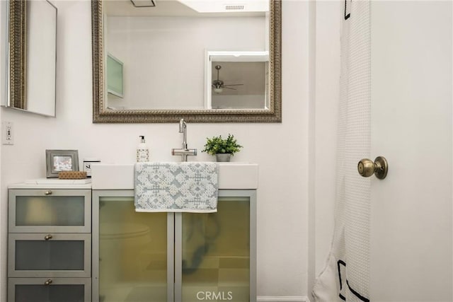 bathroom with visible vents and vanity