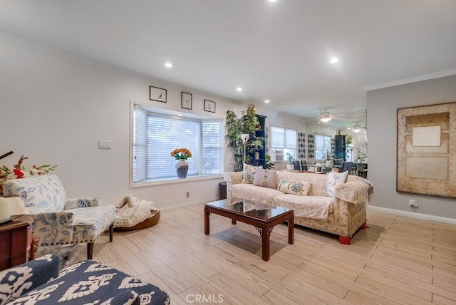 living room with recessed lighting, baseboards, light wood finished floors, and ornamental molding