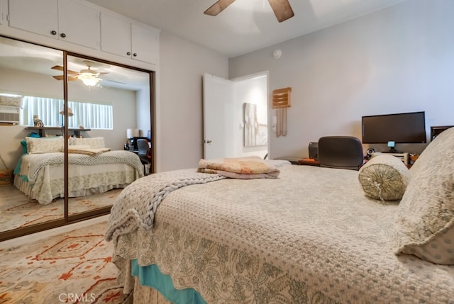 bedroom with a closet and a ceiling fan