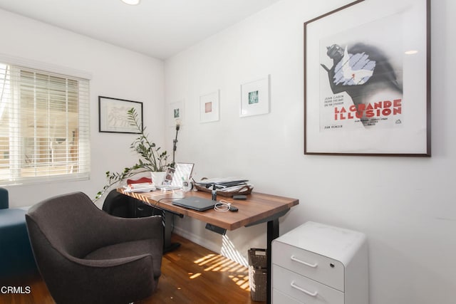 office space with dark wood finished floors