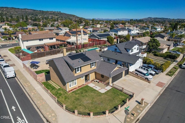 bird's eye view with a residential view and a mountain view