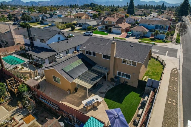 aerial view with a residential view and a mountain view