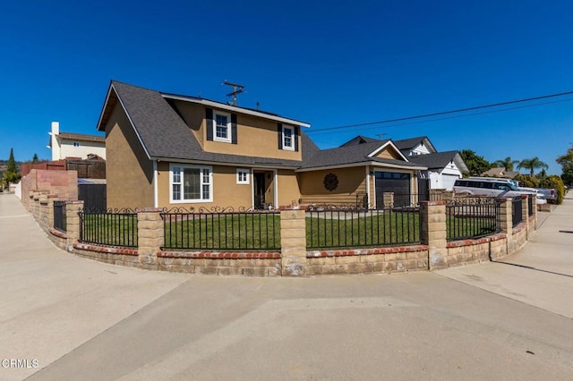 view of front of home featuring a fenced front yard, a front lawn, and stucco siding