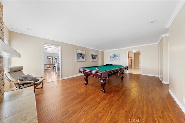 rec room featuring baseboards, ornamental molding, wood finished floors, and pool table