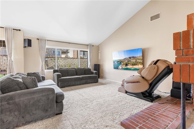 living area featuring high vaulted ceiling, carpet, visible vents, and baseboards