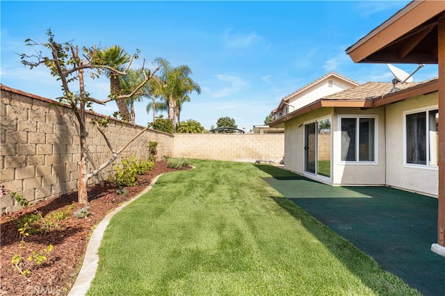 view of yard featuring a fenced backyard