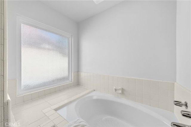 bathroom with a tub