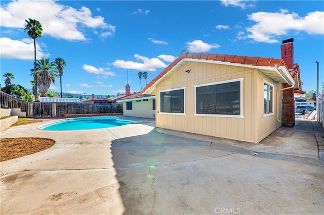 view of swimming pool featuring a patio area, a fenced backyard, and a fenced in pool