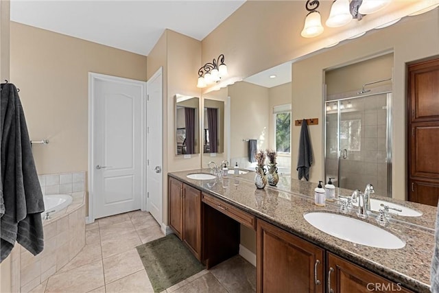 full bathroom with a bath, a stall shower, double vanity, and a sink