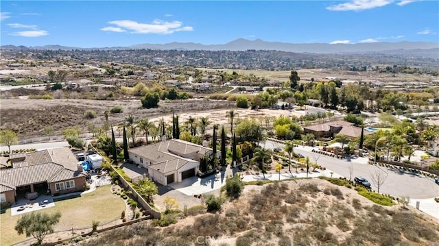 aerial view with a residential view and a mountain view