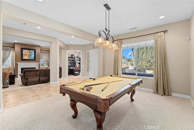 rec room featuring a fireplace, recessed lighting, light colored carpet, visible vents, and baseboards