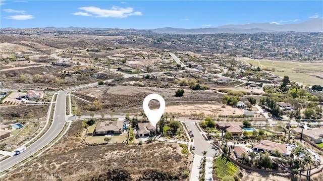 bird's eye view with a residential view and a mountain view